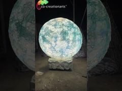 Escultura Lunar Etérea: Estatua Lunar con Textura de Cráter en Gradiente Azul Onírico​